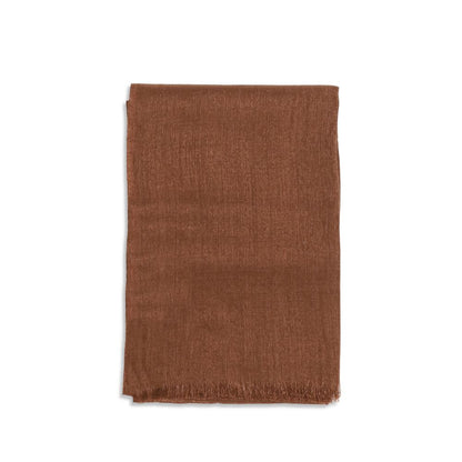 Scarf by Brunello Cucinelli for women in polyamide silk cashmere & capra leather brown features a snug silhouette, perfectly showcasing the elegant drape and premium finish of the Polyamide Silk Cashmere & Capra Leather Scarf.