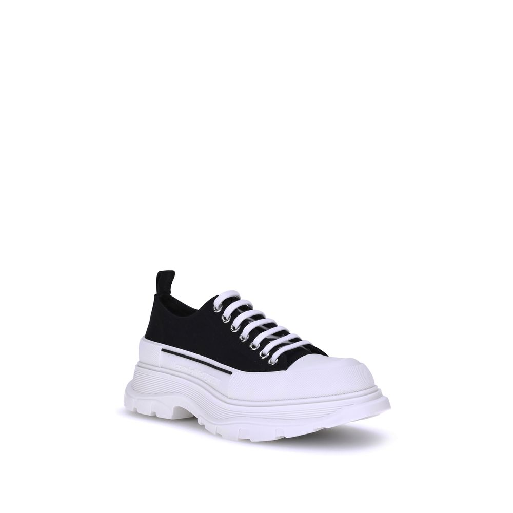 Sneakers by Alexander McQueen for men in canvas black presents a on trend silhouette from the Men's Chunky Canvas Sneakers collection, showcasing a on trend chunky style for an elevated aesthetic.