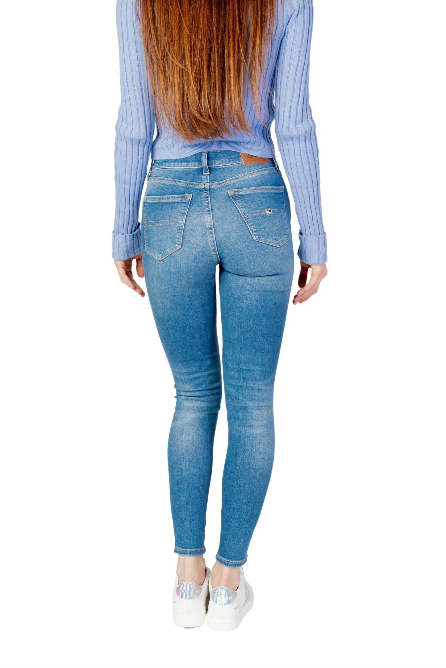 Jeans by Tommy Hilfiger for women in stretch denim cotton light-blue features an sartorial skinny and long with a cut for a sartorial finish.