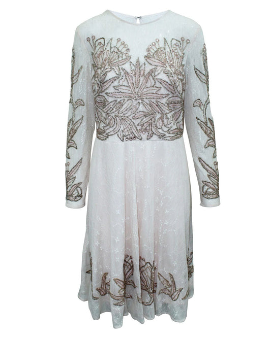 Dress by Aidan Mattox for women in silk multicolor, pink & patterned features an cute silhouette, detailed with a long-sleeve and that elegantly flows into a cute midi.