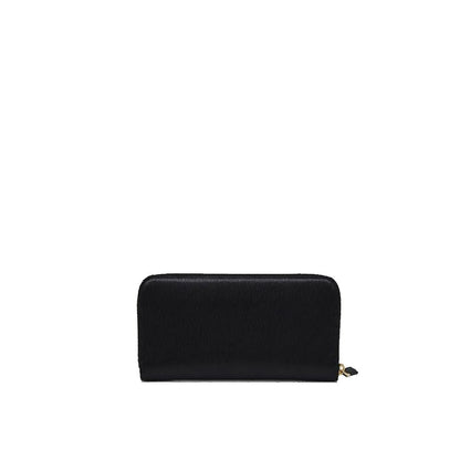 Cardholder Wallet by Prada for women in calfskin leather black showcases a discerning silhouette, artfully capturing the essence of Calfskin Leather Cardholder Wallet with its functional card-organization.