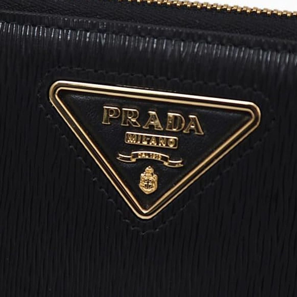Cardholder Wallet by Prada for women in calfskin leather black presents a architectural silhouette from the Calfskin Leather Cardholder Wallet collection, showcasing architectural card-organization for a architectural finish.