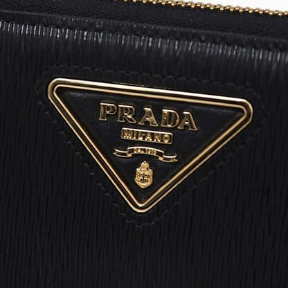 Cardholder Wallet by Prada for women in calfskin leather black presents a architectural silhouette from the Calfskin Leather Cardholder Wallet collection, showcasing architectural card-organization for a architectural finish.