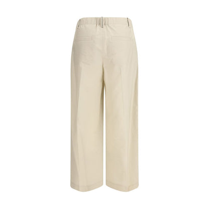 Trousers by Brunello Cucinelli for women in polyamide cotton beige presents a smart silhouette, meticulously detailed with a smart regular-fit, a smart long, and a smart .