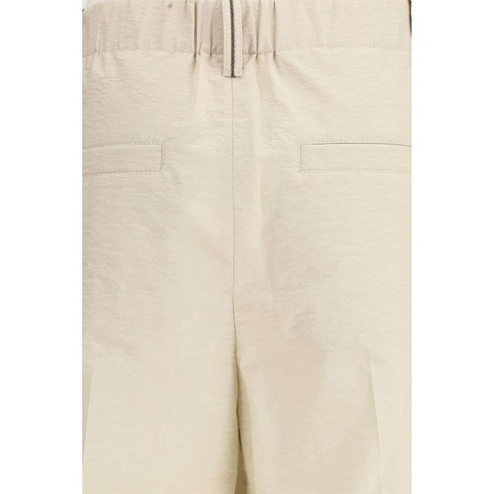 Trousers by Brunello Cucinelli for women in polyamide cotton beige features a tailored silhouette with a tailored regular-fit, defined by its long and a sophisticated .