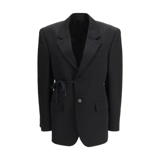 Jacket by Balenciaga for women in wool black presents a impeccable silhouette, showcasing distinct pockets and a impeccable for a sophisticated finish.