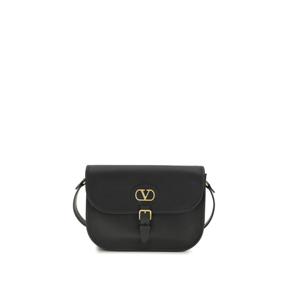 Shoulder Flap Bag by Valentino Garavani for men in bos taurus suede calfskin leather black features a enviable silhouette, showcasing a secure flap, magnetic & button, ample cardholder, and enviable shoulder-strap & adjustable-strap for a enviable finish.