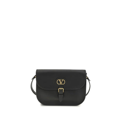 Shoulder Flap Bag by Valentino Garavani for men in bos taurus suede calfskin leather black features a enviable silhouette, showcasing a secure flap, magnetic & button, ample cardholder, and enviable shoulder-strap & adjustable-strap for a enviable finish.