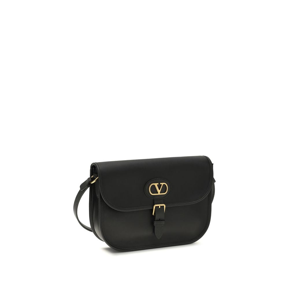 Shoulder Flap Bag by Valentino Garavani for men in bos taurus suede calfskin leather black presents a versatile silhouette, showcasing a secure flap, magnetic & button and versatile cardholder with versatile shoulder-strap & adjustable-strap for a sophisticated look.