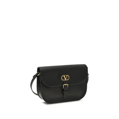 Shoulder Flap Bag by Valentino Garavani for men in bos taurus suede calfskin leather black presents a versatile silhouette, showcasing a secure flap, magnetic & button and versatile cardholder with versatile shoulder-strap & adjustable-strap for a sophisticated look.