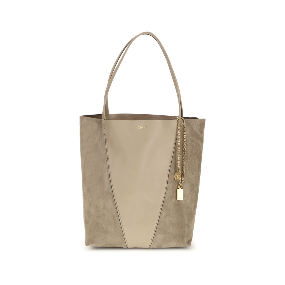 Evening Shoulder Bag by Chloé for women in grained & suede leather beige features a distinguished silhouette, showcasing a secure and distinguished with versatile shoulder-strap & handle for a distinguished finish.