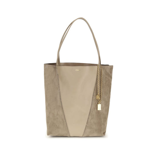 Evening Shoulder Bag by Chloé for women in grained & suede leather beige features a distinguished silhouette, showcasing a secure and distinguished with versatile shoulder-strap & handle for a distinguished finish.