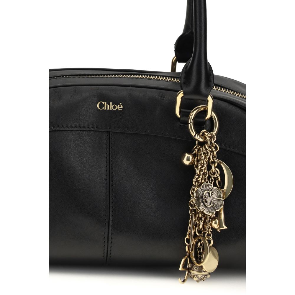 Large Bowling Shoulder Bag by Chloé for women in bos taurus calfskin leather black showcases a enviable silhouette, artfully detailed with a secure zipper, organized , and versatile handle for a enviable look.