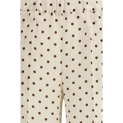 Casual Pants by P.A.R.O.S.H. for women in silk beige & print features an sophisticated and regular-fit with a precise long, creating a sophisticated and sophisticated silhouette.