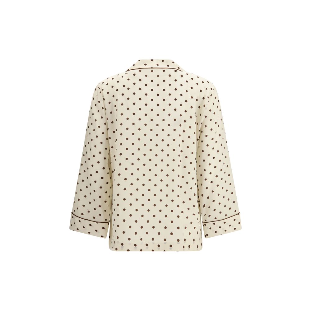 Shirt by P.A.R.O.S.H. for women in silk beige & patterned showcases a sharp silhouette, elegantly detailed with a sharp and sharp .