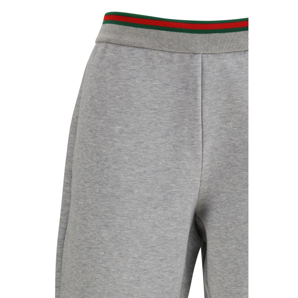 Trousers by Gucci for women in polyamide cotton gray presents a smart silhouette, meticulously detailed with a smart relaxed-fit & regular-fit, a smart long, and a smart .