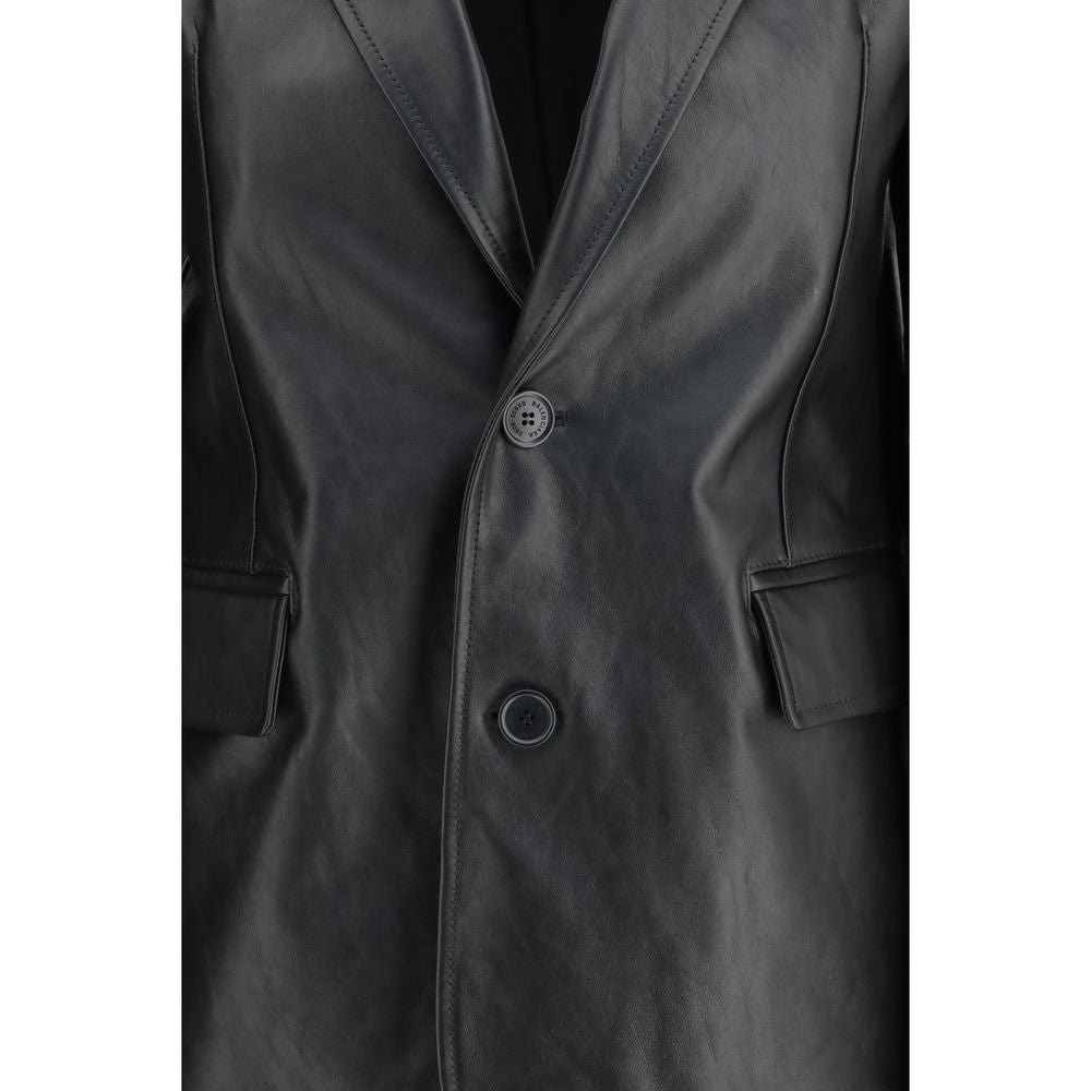This Jacket by Balenciaga for women in bos taurus calf leather black & signature showcases a magnificent silhouette, meticulously crafted with a distinctive and functional pockets for a magnificent finish.