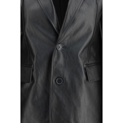 This Jacket by Balenciaga for women in bos taurus calf leather black & signature showcases a magnificent silhouette, meticulously crafted with a distinctive and functional pockets for a magnificent finish.