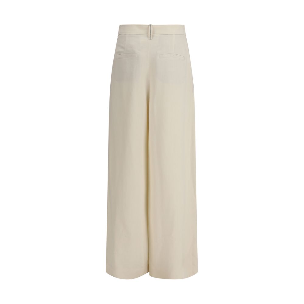 Casual Pants by Brunello Cucinelli for women in linen & viscose cream presents a refined pantology silhouette, artfully defined by a refined pantology regular-fit & wide, long, and a sophisticated high rise.