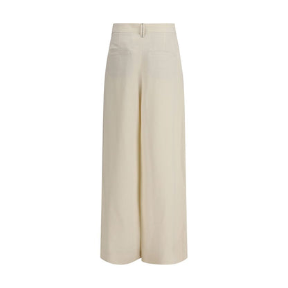 Casual Pants by Brunello Cucinelli for women in linen & viscose cream presents a refined pantology silhouette, artfully defined by a refined pantology regular-fit & wide, long, and a sophisticated high rise.