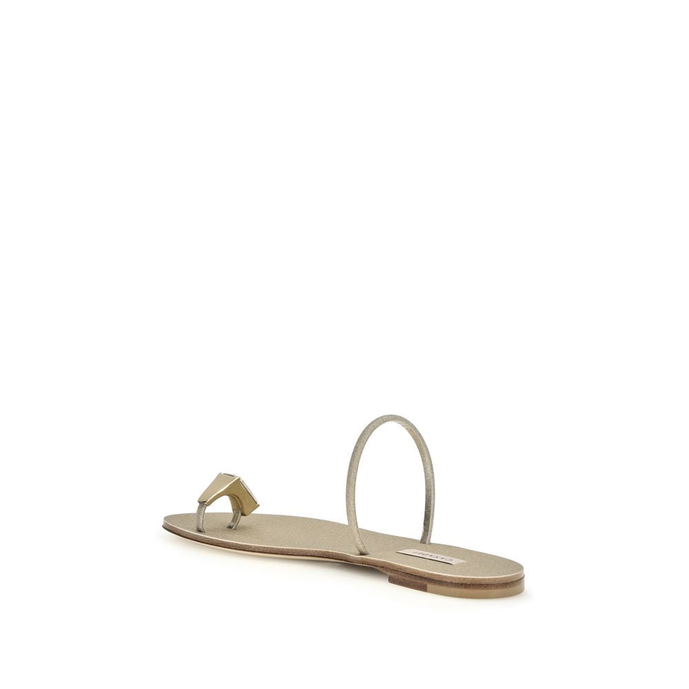 Flat Sandals by Casadei for women in bos taurus calf leather gold features an effortlessly chic silhouette from the Women's Bos Taurus Calf Leather Flat Sandals collection, showcasing a effortlessly chic flat and elegant .