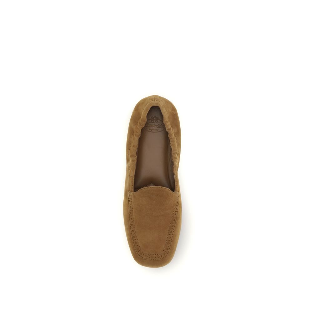 Flat Loafer Slip-On Shoes by Church's for women in bos taurus calf suede leather brown showcases a timeless silhouette from the Women's Bos Taurus Calf Suede Leather Flat Loafer Slip-On Shoes collection, featuring a timeless flat and round toe style for a timeless finish.