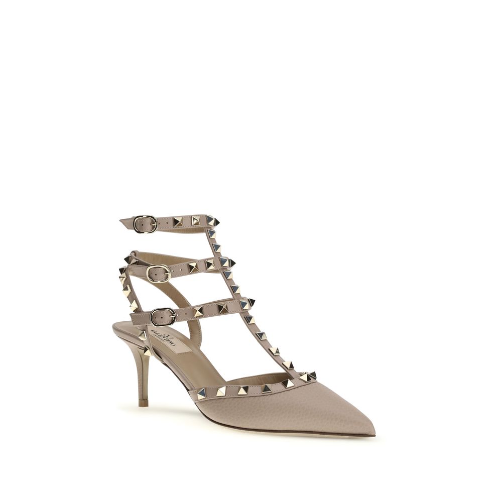 High-Heel Stiletto Ankle Strap Pumps Heels by Valentino Garavani for women in bos taurus calf leather gray features an effortlessly chic silhouette from the Rockstud Women's Bos Taurus Calf Leather High-Heel Stiletto Ankle Strap Pumps Heels collection, showcasing a stiletto high-heel and effortlessly chic for a effortlessly chic look.