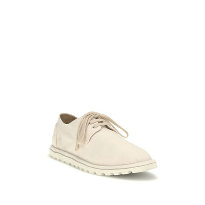 This Derby Shoes by Marsell for men in cotton & leather white features an exquisite silhouette from the Men's Cotton & Leather Derby Shoes collection, defined by a sophisticated and elegant .