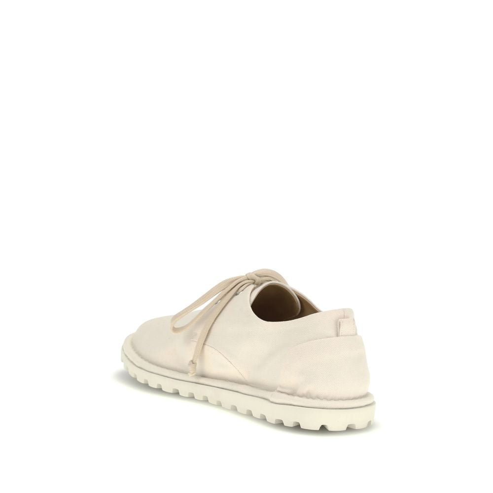 Derby Shoes by Marsell for men in cotton & leather white showcases a impeccable silhouette as Men's Cotton & Leather Derby Shoes, artfully designed with a impeccable and refined for a impeccable finish.