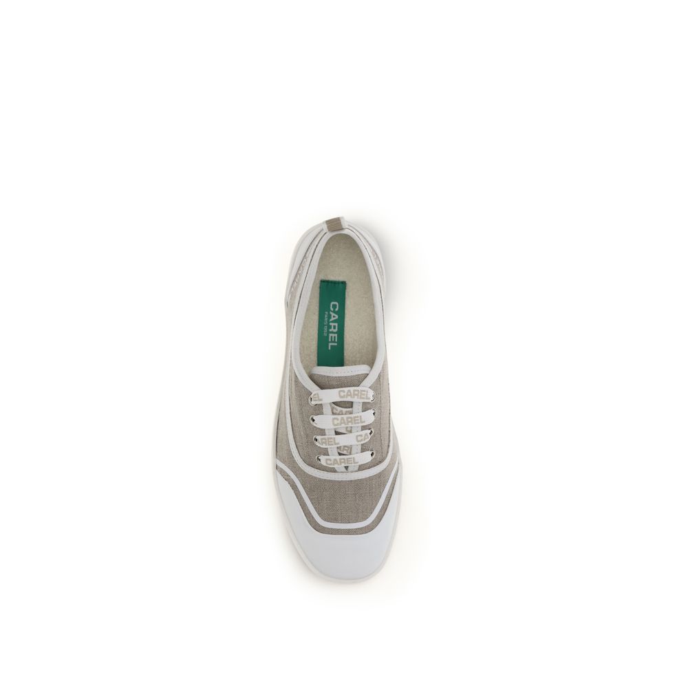 Sneakers by Carel Paris for women in cotton canvas beige features a chic design, perfectly showcasing the chic low-top style of this Women's Low Top Cotton Canvas Sneakers.