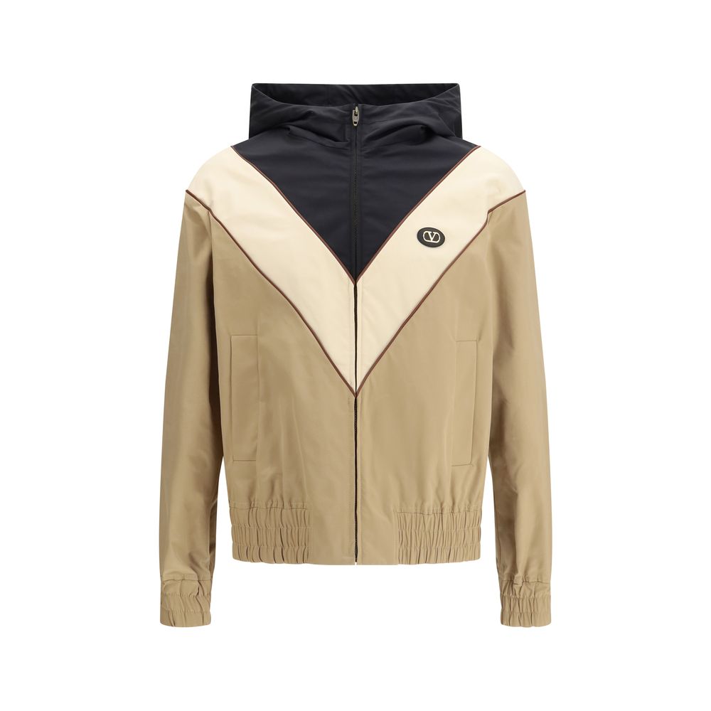 Hooded Windbreaker Jacket by Valentino Garavani for men in nylon & polyester multicolor showcases a modern silhouette, integrating pockets, hooded & windproof and a modern hooded neckline for a sophisticated finish.