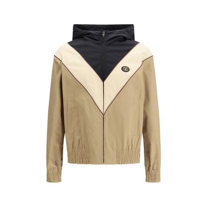 Hooded Windbreaker Jacket by Valentino Garavani for men in nylon & polyester multicolor showcases a modern silhouette, integrating pockets, hooded & windproof and a modern hooded neckline for a sophisticated finish.