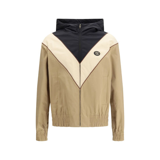 Hooded Windbreaker Jacket by Valentino Garavani for men in nylon & polyester multicolor showcases a modern silhouette, integrating pockets, hooded & windproof and a modern hooded neckline for a sophisticated finish.