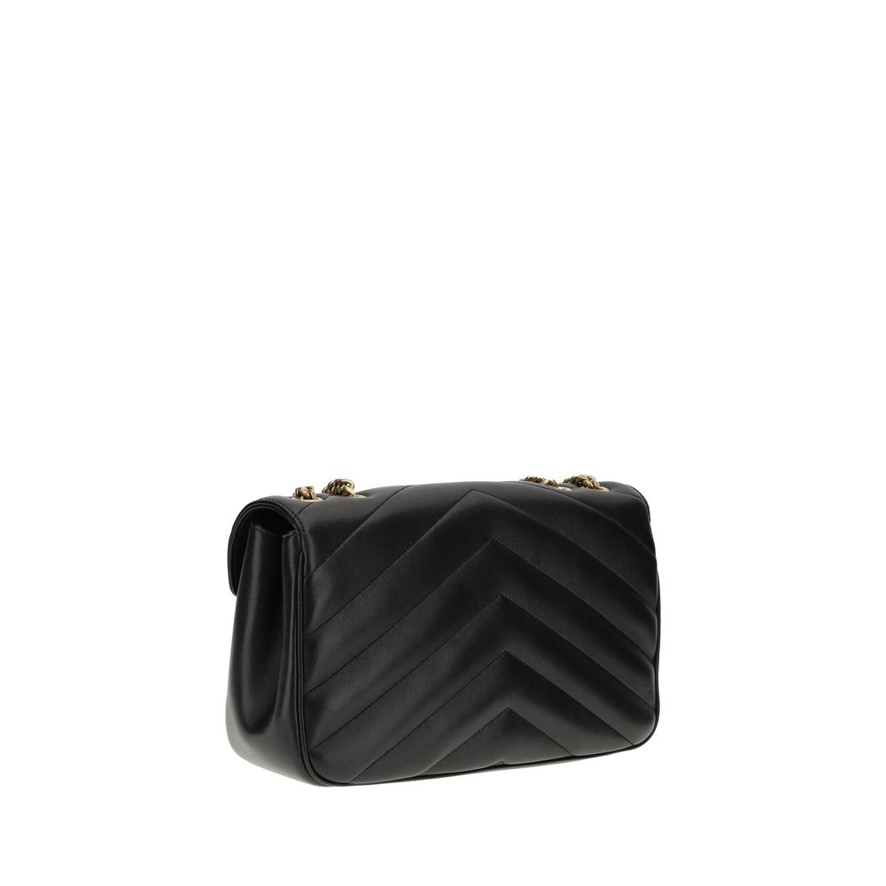 Quilted 2-in-1 Shoulder & Crossbody Flap Bag by Saint Laurent for women in bio-acetate & bos taurus calf leather black showcases a enviable silhouette, artfully detailed with a secure flap & magnetic, organized , and versatile crossbody-strap, shoulder-strap & adjustable-strap for a enviable look.