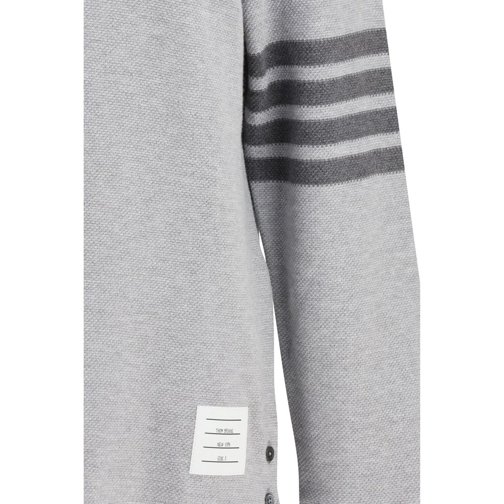 Polo Shirt by Thom Browne for men in cotton gray, signature & striped showcases a sharp silhouette, detailed with a refined and sharp for a sophisticated finish.