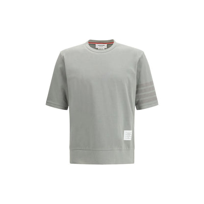 Activewear T-Shirt by Thom Browne for men in cotton gray & signature features a dynamic silhouette with and crew neckline enhanced by functional .