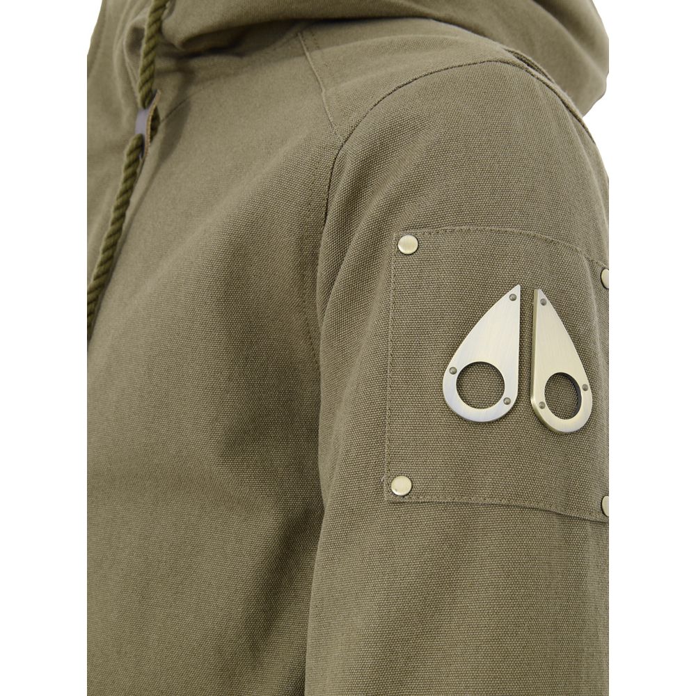 Hooded Parka by Moose Knuckles for men in nylon cotton & sherpa fur green features a stylish silhouette, meticulously detailed with a sophisticated hooded neckline and functional pockets & hooded for a stylish finish.