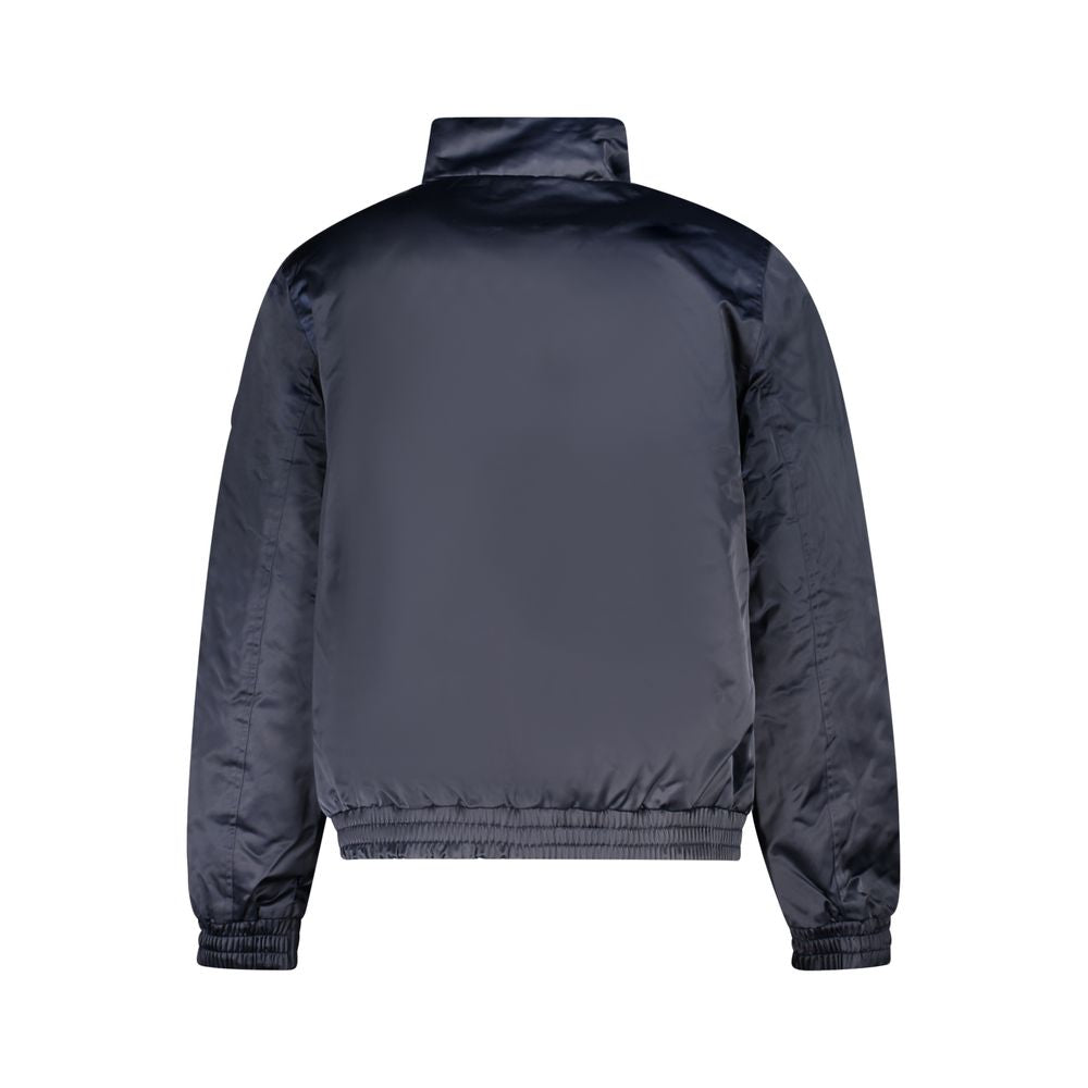 This Bomber Jacket by Calvin Klein for men in polyester blue & print exhibits a edgy silhouette, meticulously detailed with functional and a edgy for a edgy finish.