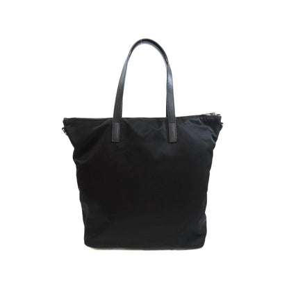 Tote Bag by Prada for women in nylon fabric black features an jet-setting Nylon Fabric Tote Bag design with a secure zipper, jet-setting , and versatile shoulder-strap & handle for a jet-setting look.