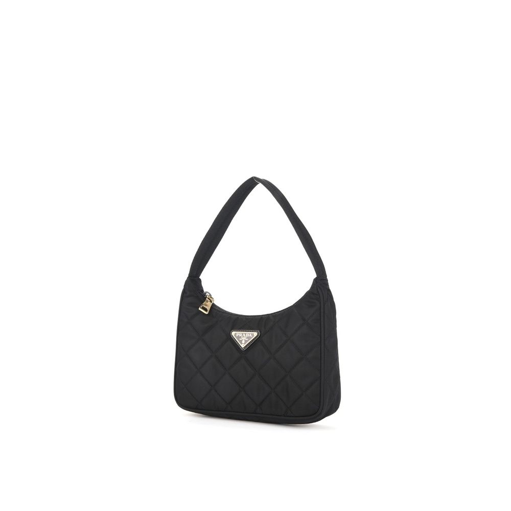 Quilted Shoulder Bag by Prada for women in lyocell black features a effortless sophistication silhouette, secured by a zipper with ample and versatile shoulder-strap & handle for a effortless sophistication finish.