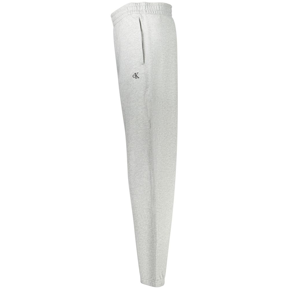 Joggers by Calvin Klein for men in cotton gray features an sartorial and long with a cut for a sartorial finish.