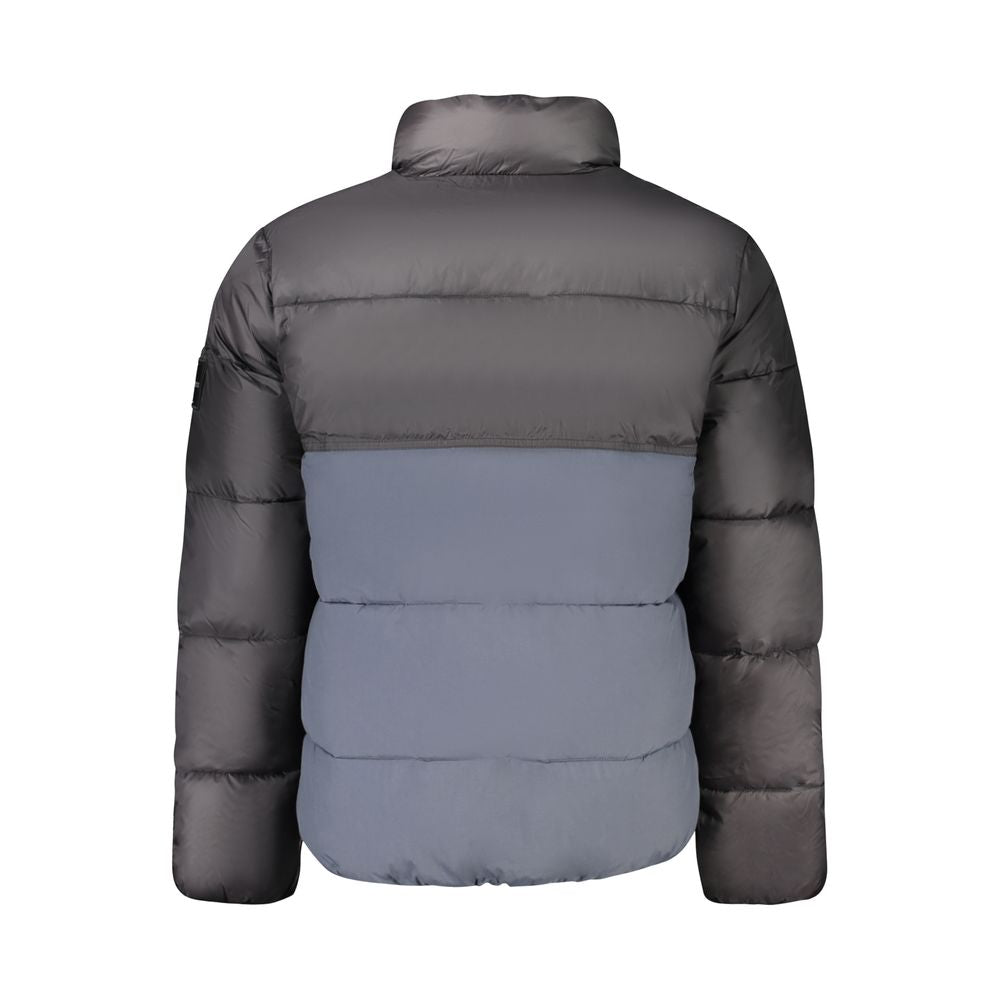 Windbreaker Jacket by Calvin Klein for men in polyester black, blue & print presents a resilient silhouette, artfully detailed with a sophisticated and functional pockets & windproof for a resilient finish.