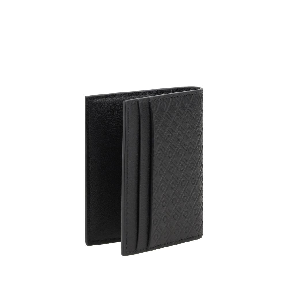 Cardholder Wallet by Ferragamo for men in bos taurus calf leather black & monogram showcases a discerning silhouette, artfully capturing the essence of Bos Taurus Calf Leather Cardholder Wallet with its functional card-organization compact-design billfold.