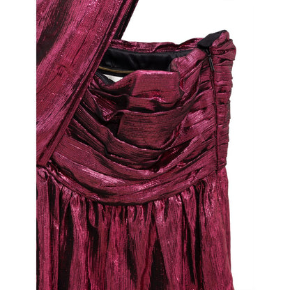 Dress by Saint Laurent for women in viscose & silk fuchsia features an cute silhouette, detailed with a and halter neckline that elegantly flows into a cute short mini.