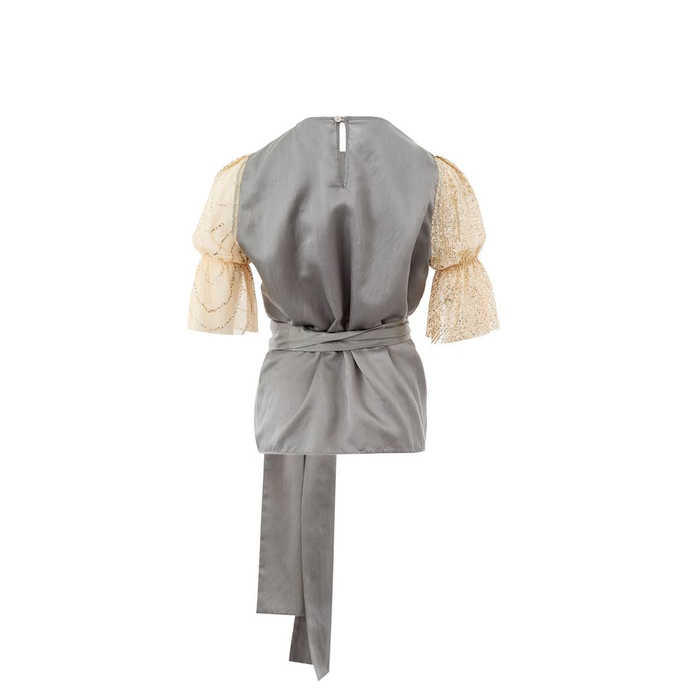 Pajamas by Lardini for women in cotton silk & sequins gold & multicolor features a enveloping silhouette, artfully capturing the enveloping essence of the Women's Cotton SIlk & Sequins Pajamas design for a sophisticated lounging look.