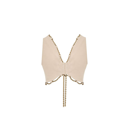 Vest by Cult Gaia for women in cotton & metal beige & gold showcases a dynamic silhouette, perfectly balancing with a dynamic for a sophisticated, high-fashion look.