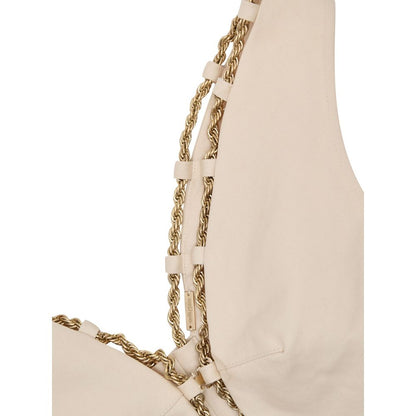 Vest by Cult Gaia for women in cotton & metal beige & gold showcases a utilitarian silhouette, artfully incorporating and a utilitarian for a truly utilitarian finish.