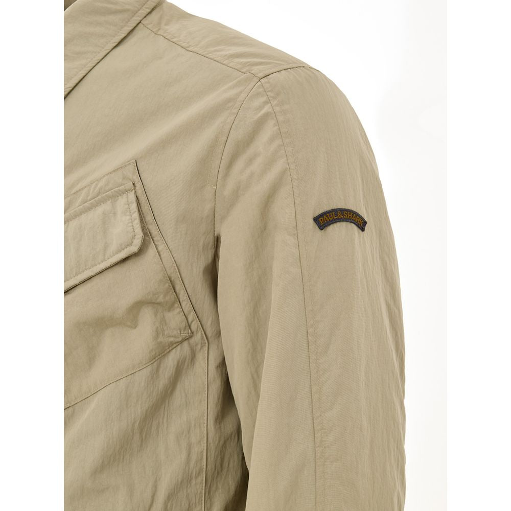 Overcoat by Paul & Shark for men in poly nylon fabric beige features a cosy chic silhouette, artfully detailed with a sophisticated and premium pockets & insulated for a cosy chic finish.