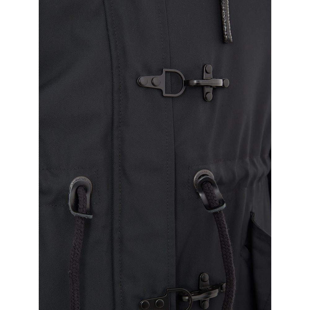 Hooded Parka by Moose Knuckles for women in sheep leather nylon cotton & fur blue presents a decadent silhouette, showcasing the decadent hooded neckline and functional pockets & hooded for a premium, weather-ready look.