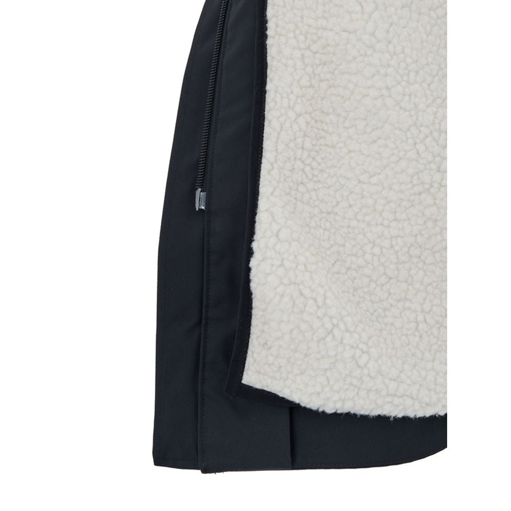 Hooded Parka by Moose Knuckles for women in sheep leather nylon cotton & fur blue features a stylish silhouette, meticulously detailed with a sophisticated hooded neckline and functional pockets & hooded for a stylish finish.